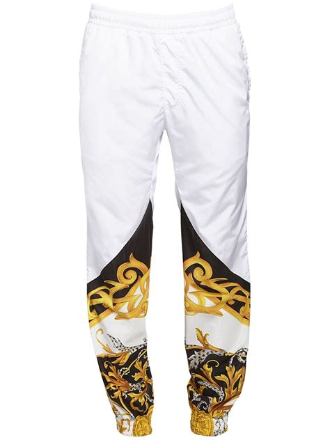 versace track pants mens white|Versace track pants.